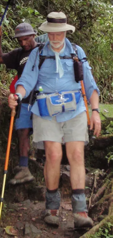 A trekker on the Track in hiking boots